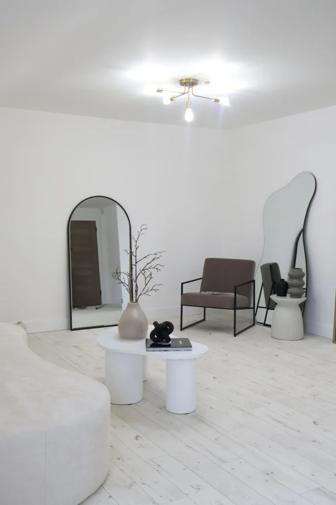 Photography studio set with armchair and full-length mirrors
