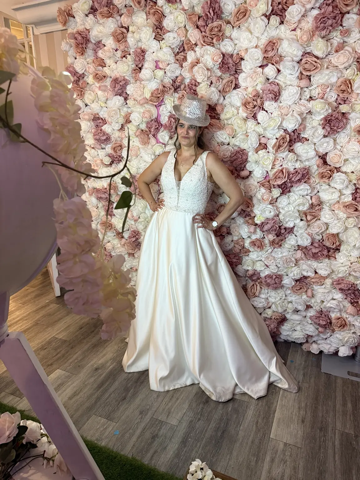 Pink flower wall at a wedding