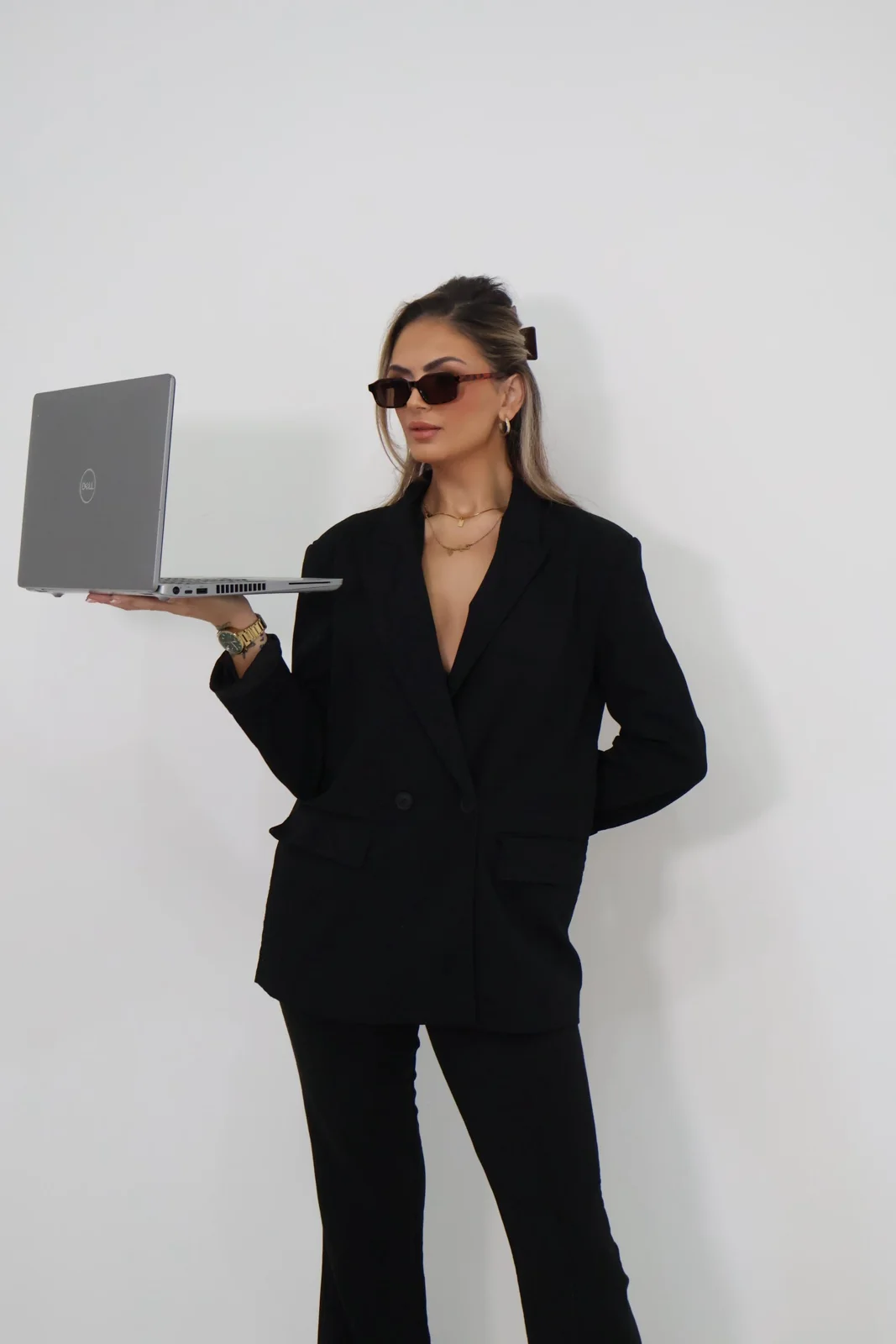 Personal branding portrait with laptop at Selfie Studios
